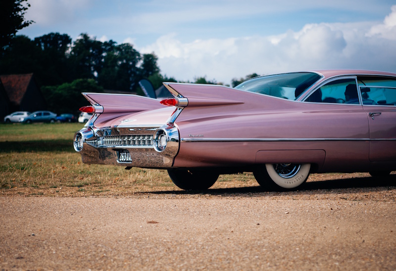 Pink classic car with fins