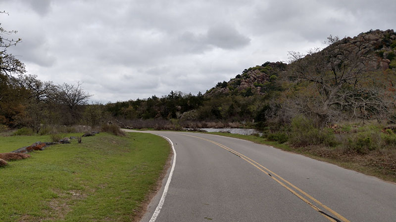 curving road with rocky hills curving road with rocky hills