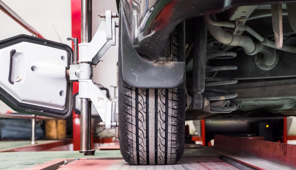 Rear end of a vehicle with jack