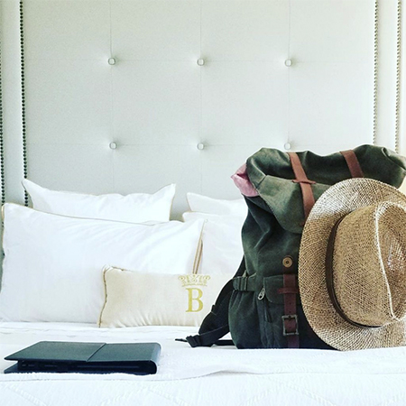 luggage on a bed
