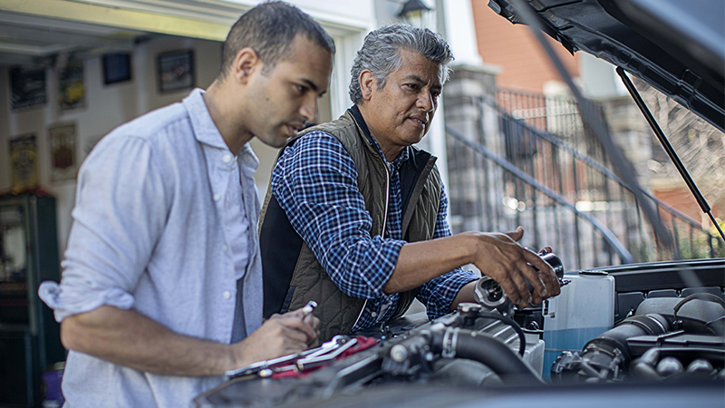father-son2 father and son working under the hood